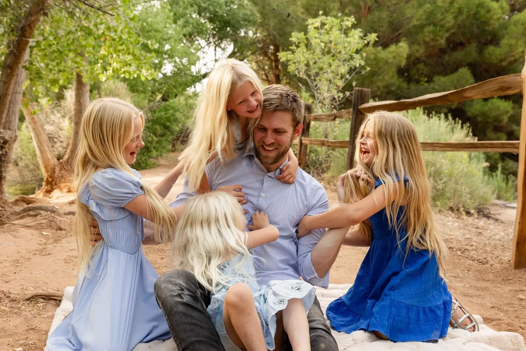 Happy family enjoying their photo session in Southern Utah